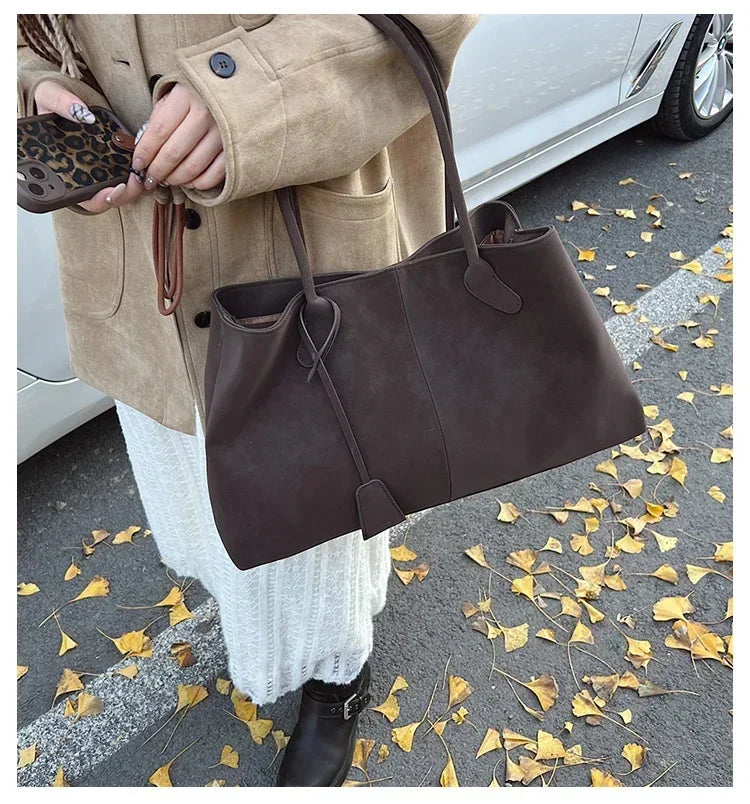 Cor sólida venda quente camurça falsa moda versátil bolsa 2025 produto de alta qualidade grande capacidade sacos de ombro femininos