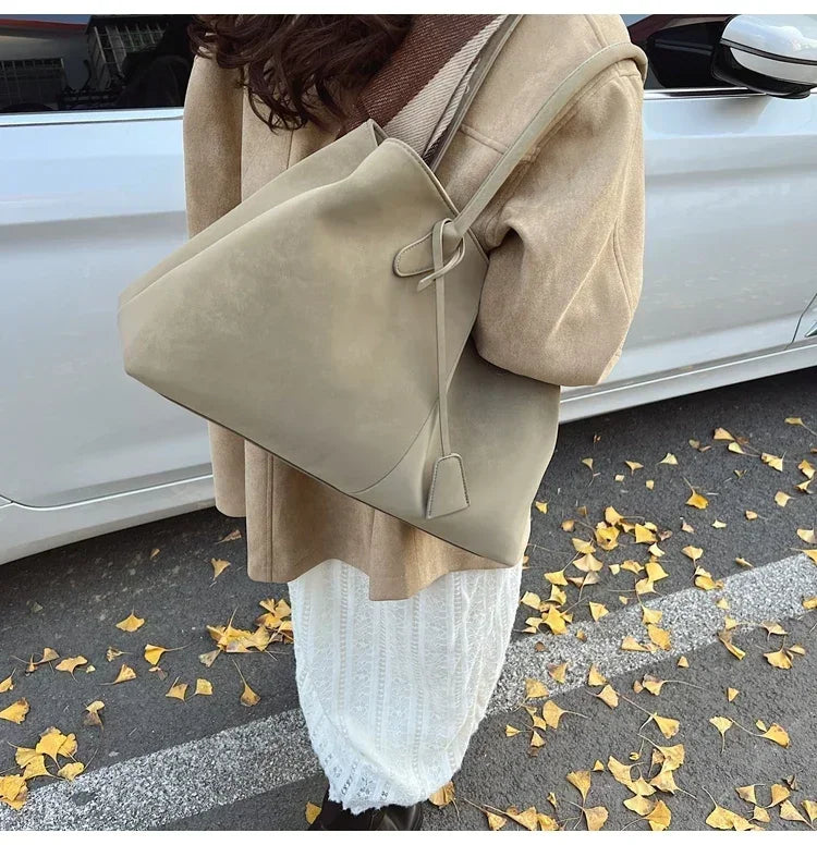 Cor sólida venda quente camurça falsa moda versátil bolsa 2025 produto de alta qualidade grande capacidade sacos de ombro femininos