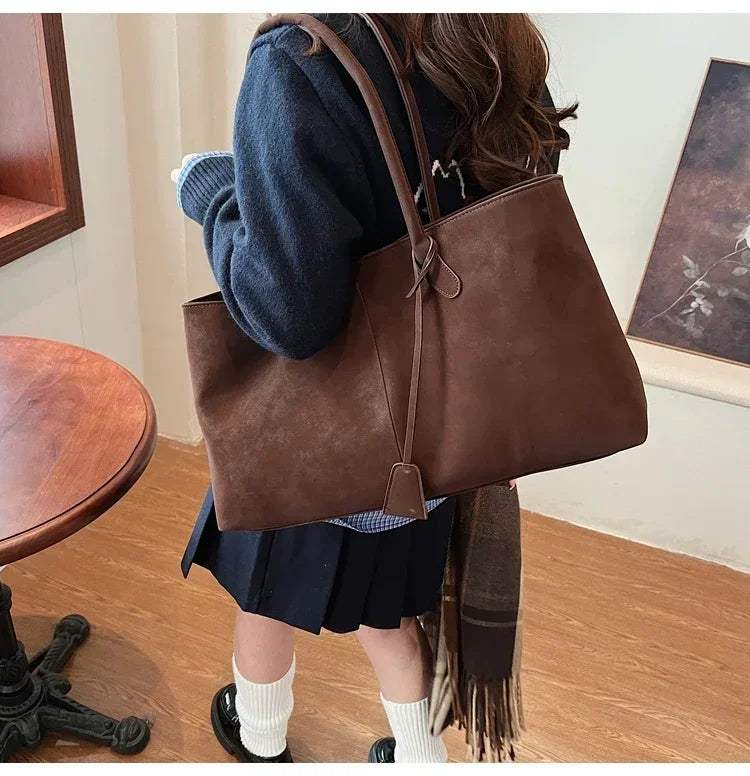 Cor sólida venda quente camurça falsa moda versátil bolsa 2025 produto de alta qualidade grande capacidade sacos de ombro femininos