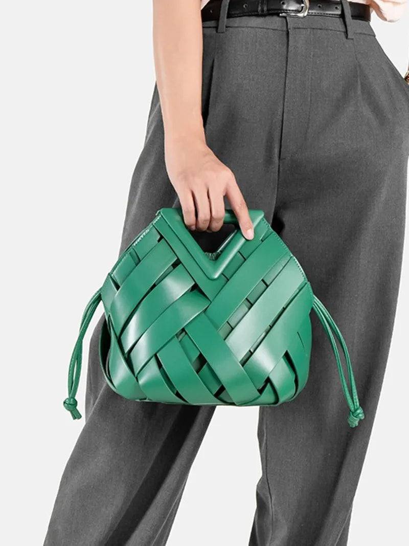 2024 novo design de luxo moda tecido bolsa couro genuíno francês portátil retro tendência bolsa ombro oco para fora balde saco