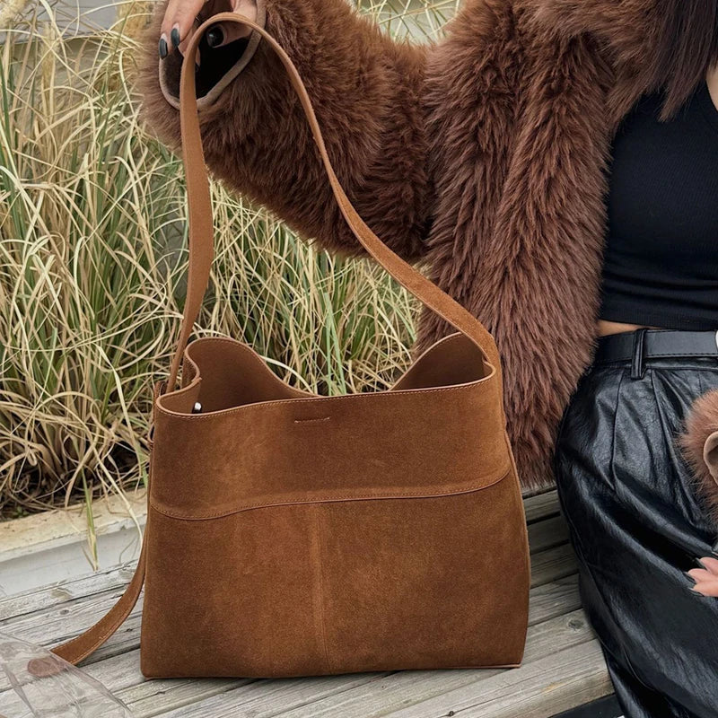 Bolsas de couro genuíno coreanas para mulheres bolsas e bolsas de grife de luxo 2024 novas em couro de vaca de grande capacidade com bolso interno bolsa de ombro nas axilas alta qualidade Frete grátis Envio rápido cheg