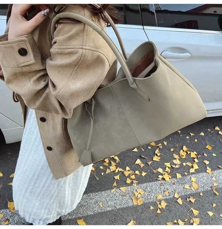 Cor sólida venda quente camurça falsa moda versátil bolsa 2025 produto de alta qualidade grande capacidade sacos de ombro femininos