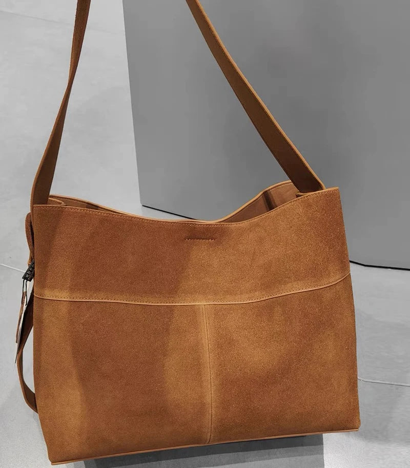 Bolsas de couro genuíno coreanas para mulheres bolsas e bolsas de grife de luxo 2024 novas em couro de vaca de grande capacidade com bolso interno bolsa de ombro nas axilas alta qualidade Frete grátis Envio rápido cheg