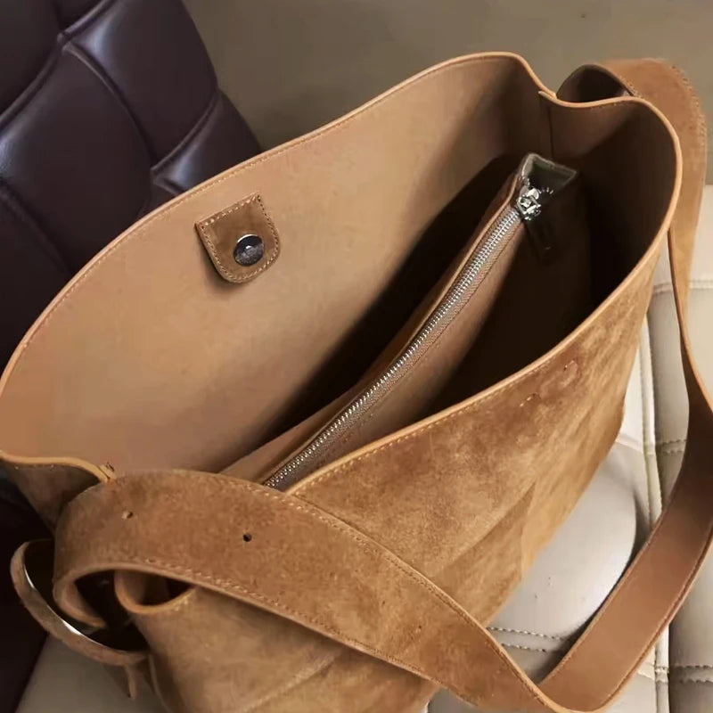 Bolsas de couro genuíno coreanas para mulheres bolsas e bolsas de grife de luxo 2024 novas em couro de vaca de grande capacidade com bolso interno bolsa de ombro nas axilas alta qualidade Frete grátis Envio rápido cheg