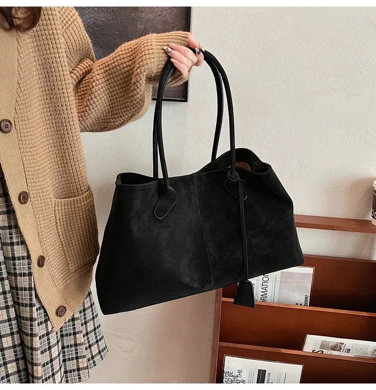Cor sólida venda quente camurça falsa moda versátil bolsa 2025 produto de alta qualidade grande capacidade sacos de ombro femininos