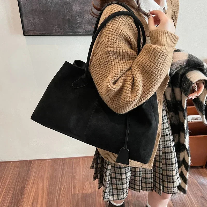 Cor sólida venda quente camurça falsa moda versátil bolsa 2025 produto de alta qualidade grande capacidade sacos de ombro femininos