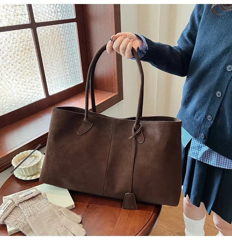 Cor sólida venda quente camurça falsa moda versátil bolsa 2025 produto de alta qualidade grande capacidade sacos de ombro femininos