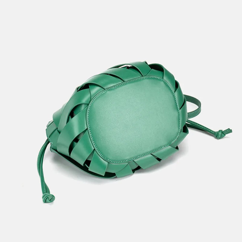 2024 novo design de luxo moda tecido bolsa couro genuíno francês portátil retro tendência bolsa ombro oco para fora balde saco