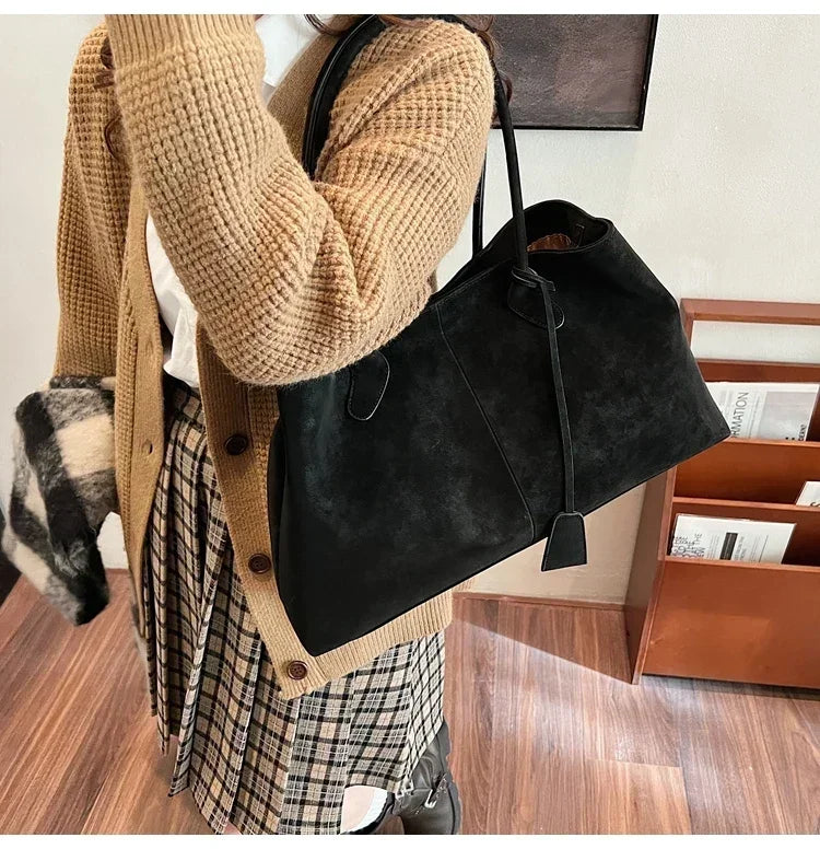 Cor sólida venda quente camurça falsa moda versátil bolsa 2025 produto de alta qualidade grande capacidade sacos de ombro femininos