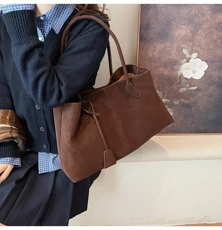 Cor sólida venda quente camurça falsa moda versátil bolsa 2025 produto de alta qualidade grande capacidade sacos de ombro femininos