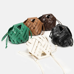 2024 novo design de luxo moda tecido bolsa couro genuíno francês portátil retro tendência bolsa ombro oco para fora balde saco