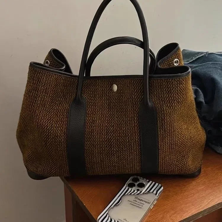 Novo nicho pequeno alto nível de aparência moda feminina temperamento lã ombro único carregando grande saco tudo-em-um mochila