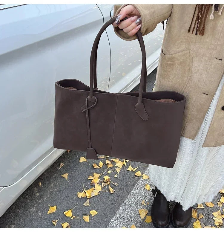Cor sólida venda quente camurça falsa moda versátil bolsa 2025 produto de alta qualidade grande capacidade sacos de ombro femininos